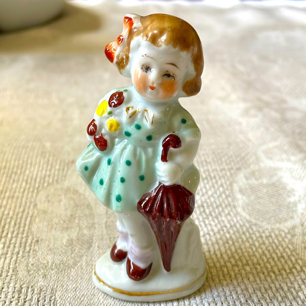 Vintage made in Occupied Japan little girl with umbrella figurine